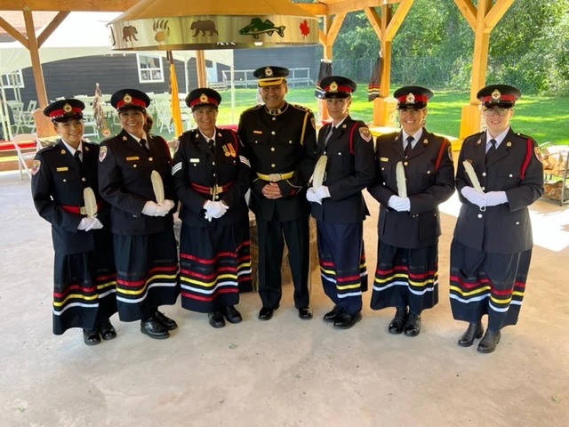 Anishinabek Police Service officers wearing ribbon skirts